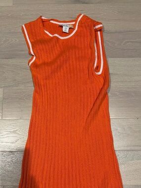 orange mini dress with white trim